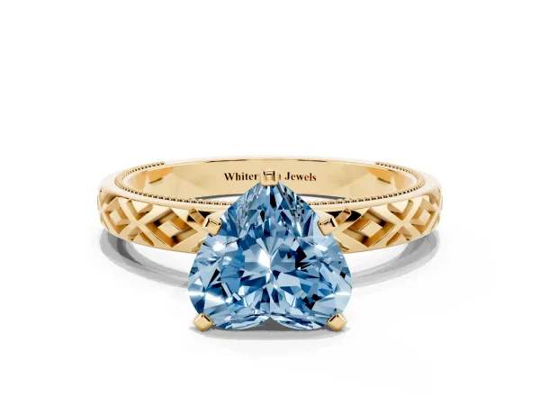 Fancy Blue Heart Cut Solitaire Diamond Ring with Milgrain and Black Enamel X Pattern Band Yellow gold
