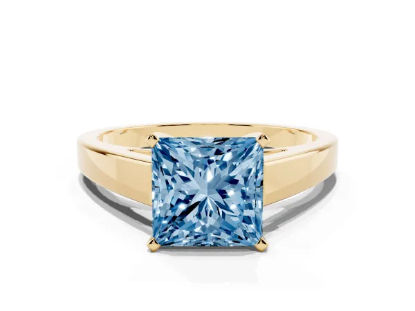 Fancy Blue Princess Cut Solitaire Engagement Ring with Four-Prong Setting and Tapered Band Yellow gold
