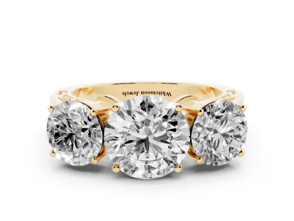 Round Cut Diamond Three-Stone Ring with Prong Setting and Textured Band Yellow gold