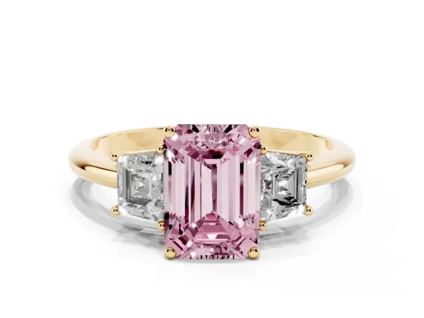 Fancy Pink Emerald Cut Diamond Three-Stone Ring with Trapezoid Side Stones and Prong Setting Yellow gold