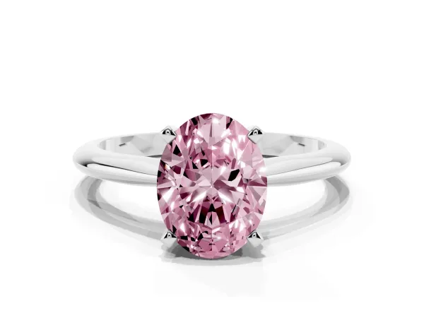Fancy Pink Oval Cut Cut Solitaire Ring with Four-Prong Setting on a Classic Band Platinum