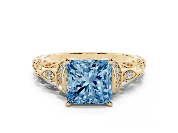 Fancy Blue Princess Cut Diamond Solitaire Ring with Filigree Band and Four-Prong Setting Yellow gold