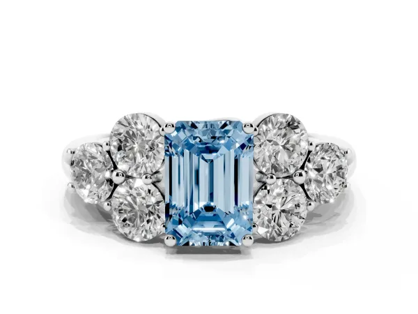 Fancy Blue Emerald Cut Cut Diamond Cluster Ring with Round Accent Stones and Prong Setting on a Classic Band Platinum