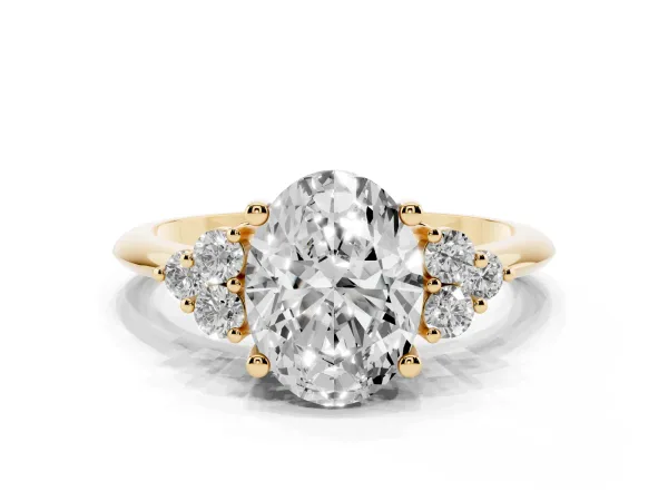 Oval Cut Cut Diamond Cluster Ring with Solitaire Band and Four-Prong Setting Yellow gold