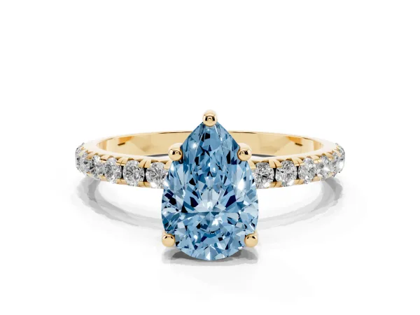 Fancy Blue Pear Cut Cut Diamond Solitaire Ring with Micro Pave Band and Four Prong Setting Yellow gold