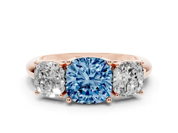 Fancy Blue Three-Stone Cushion Cut Cut Diamond Engagement Ring with Prong Setting on a White Gold Band Rose gold