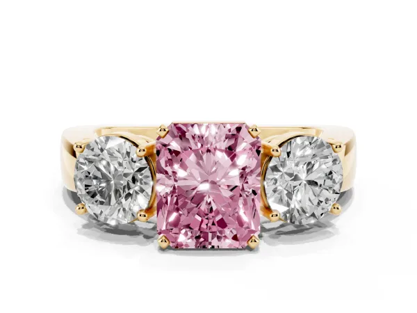 Fancy Pink Three-Stone Radiant Cut Diamond Ring with Round Side Stones, Classic Band, and Four-Prong Setting Yellow gold