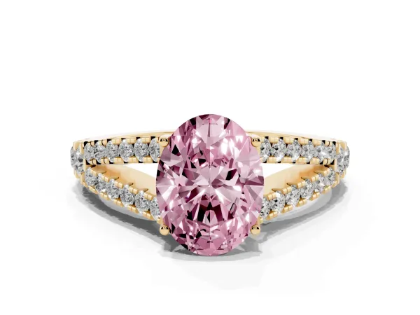 Fancy Pink Oval Cut Diamond Split Shank Engagement Ring with Round Pavé and Prong Setting Yellow gold