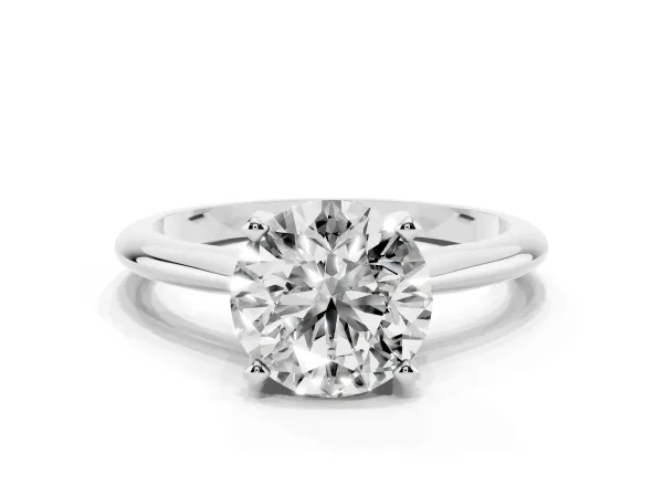 Round Cut Cut Solitaire Ring with Four-Prong Setting on a Classic Band White gold