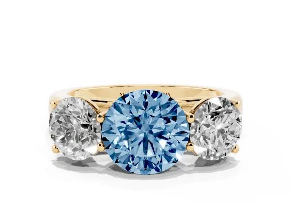 Fancy Blue Round Cut Three-Stone Diamond Ring with Prong Setting on a Classic Band Yellow gold