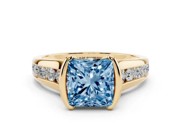 Fancy Blue Princess Cut Solitaire Bezel-Set Diamond Ring with Channel-Set Band Yellow gold