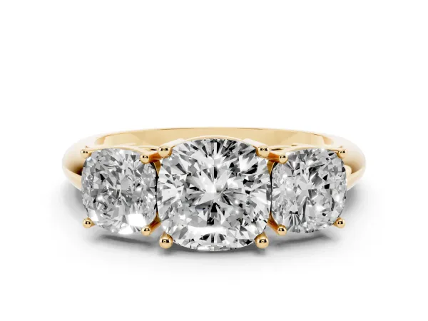 Three-Stone Cushion Cut Cut Diamond Engagement Ring with Prong Setting on a White Gold Band Yellow gold