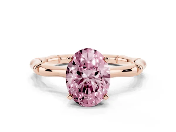 Fancy Pink Oval Cut Solitaire Diamond Ring with Bamboo Band and Four-Prong Setting Rose gold