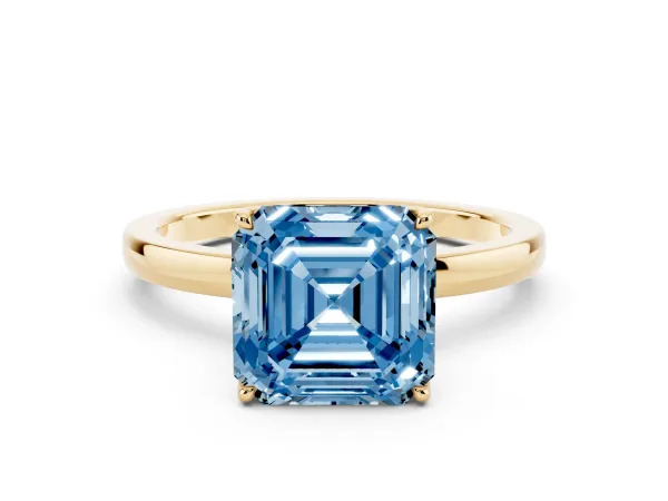 Fancy Blue Asscher Cut Diamond Solitaire Ring with Thin Band and Prong Setting Yellow gold
