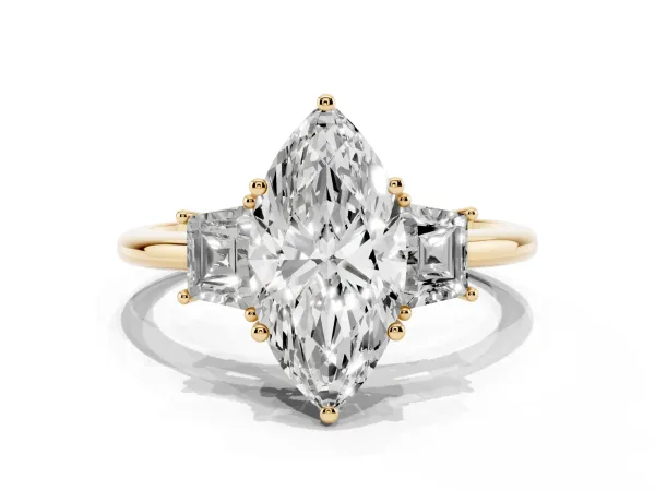 Marquise Cut Diamond Three-Stone Ring with Trapezoid Side Stones and Prong Setting Yellow gold
