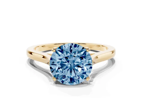 Fancy Blue Round Cut Solitaire Heart Prong Engagement Ring with Tapered Band Yellow gold