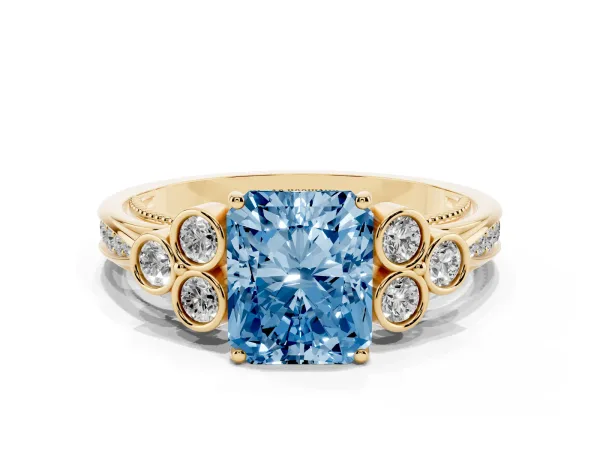 Fancy Blue Radiant Cut Cut Diamond Engagement Ring with Bezel Set Round Side Stones and Prong Setting Yellow gold
