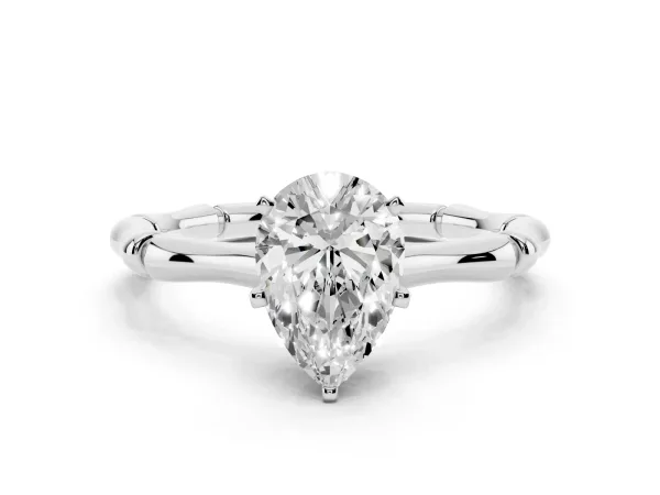 Pear Cut Solitaire Diamond Ring with Bamboo Band and Four-Prong Setting Platinum