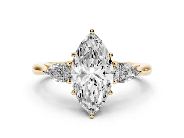 Three-Stone Marquise Cut Brilliant Diamond Solitaire Ring with Tapered Band and Four-Prong Setting Yellow gold