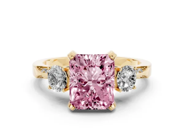 Fancy Pink Radiant Cut Brilliant Three-Stone Diamond Ring with Pavé Band and Four-Prong Setting Yellow gold