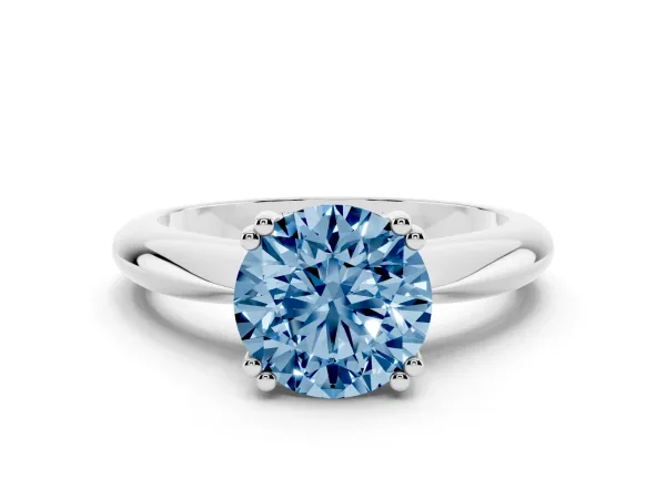 Fancy Blue Round Cut Cut Solitaire Engagement Ring with Tapered Band and Four-Prong Setting Platinum