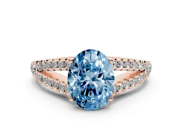 Fancy Blue Oval Cut Diamond Split Shank Engagement Ring with Round Pavé and Prong Setting Rose gold