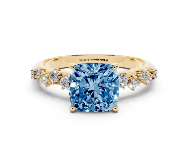 Fancy Blue Cushion Cut Diamond Cluster Side Stone Solitaire Ring with Prong Setting Yellow gold