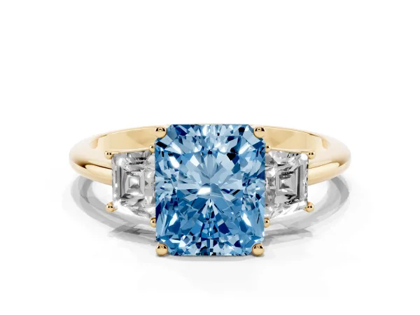 Fancy Blue Radiant Cut Diamond Three-Stone Ring with Trapezoid Side Stones and Prong Setting Yellow gold