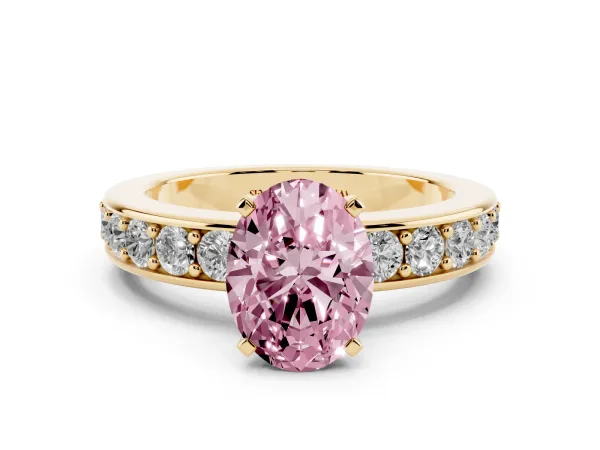 Fancy Pink Oval Cut Diamond Engagement Ring with Channel Set Round Band and Prong Setting Yellow gold