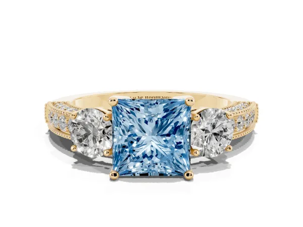 Fancy Blue Princess Cut Three-Stone Diamond Ring with Pavé Band and Four-Prong Setting Yellow gold