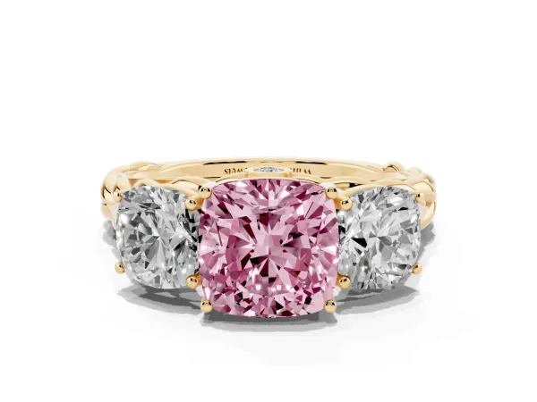 Fancy Pink Three-Stone Cushion Cut Diamond Braided Band Ring with Four-Prong Setting Yellow gold