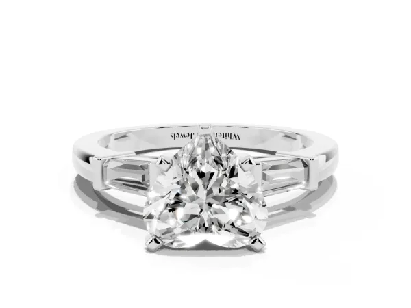 Heart Cut Cut Diamond Solitaire Ring with Tapered Baguette Accents and Four-Prong Setting White gold