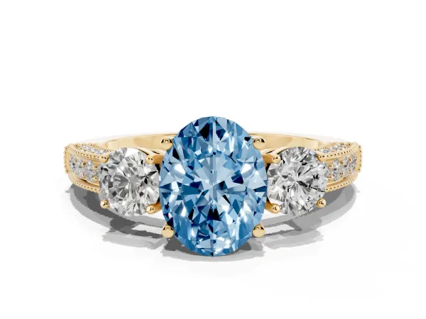 Fancy Blue Oval Cut Three-Stone Diamond Ring with Pavé Band and Four-Prong Setting Yellow gold