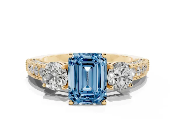 Fancy Blue Emerald Cut Three-Stone Diamond Ring with Pavé Band and Four-Prong Setting Yellow gold
