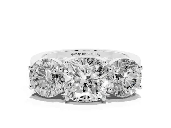 Three-Stone Cushion Cut Diamond Engagement Ring with Prong Setting on a Classic Band White gold
