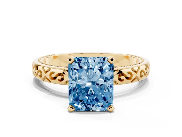 Fancy Blue Radiant Cut Solitaire Engagement Ring with Scrollwork Band and Four-Prong Setting Yellow gold