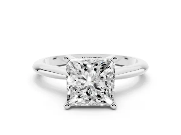 Princess Cut Cut Solitaire Ring with Four-Prong Setting on a Classic Band White gold