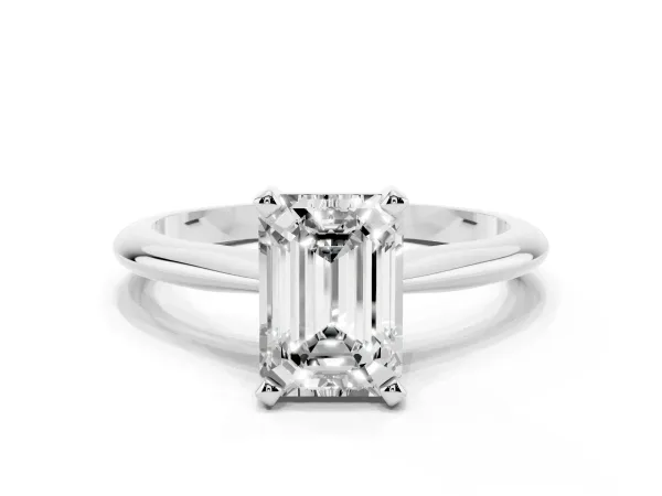 Emerald Cut Cut Solitaire Ring with Four-Prong Setting on a Classic Band Platinum