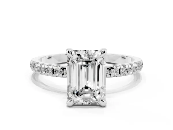 Emerald Cut Diamond Brilliant Solitaire Ring with Pavé Band and Four-Prong Setting White gold