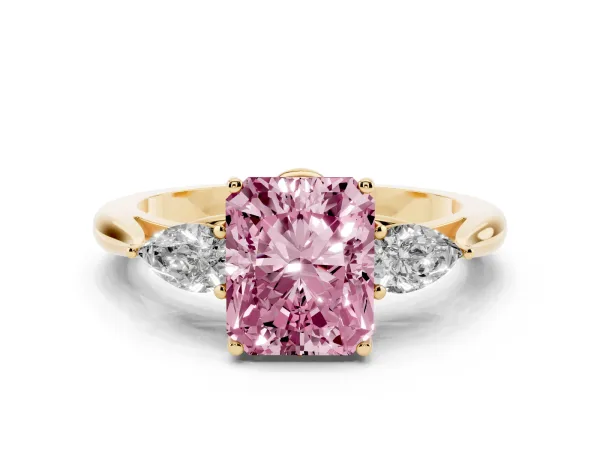 Fancy Pink Three-Stone Radiant Cut Brilliant Diamond Solitaire Ring with Tapered Band and Four-Prong Setting Yellow gold