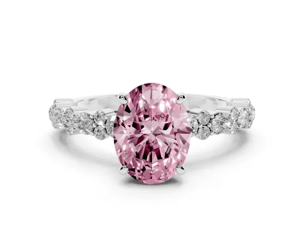Fancy Pink Oval Cut Diamond Side Stone Solitaire Ring with Round and Four-Prong Setting Platinum