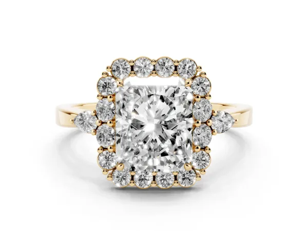 Radiant Cut Diamond Halo Ring with Pear Side Stones and Prong Setting Yellow gold