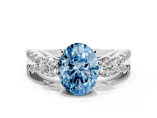 Fancy Blue Oval Cut Diamond Three-Stone Ring with Pavé Split Shank and Four-Prong Setting Platinum