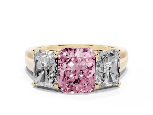 Fancy Pink Radiant Cut Three-Stone Diamond Ring with Prong Setting on a Classic Band Yellow gold