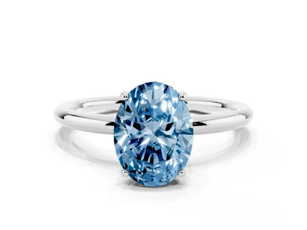 Fancy Blue Oval Cut Solitaire Diamond Ring with a Classic Band and Four-Prong Setting White gold