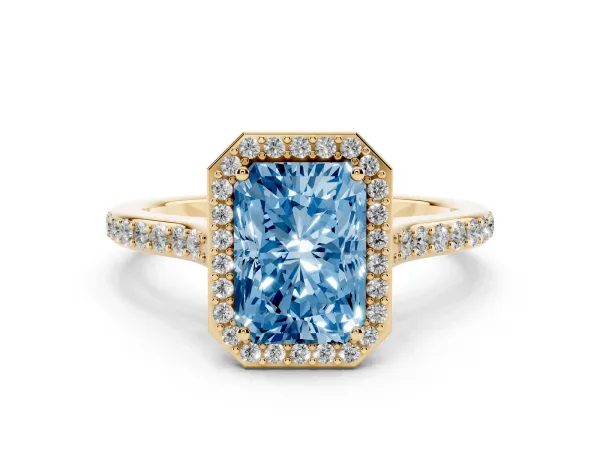 Fancy Blue Radiant Cut Diamond Halo Engagement Ring with Round Pavé Shoulders and Prong Setting Yellow gold