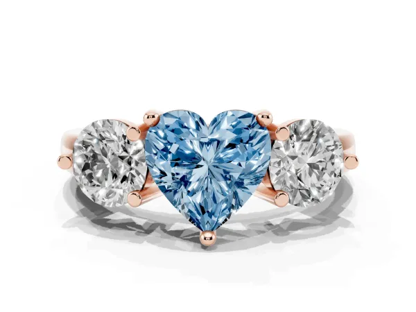 Fancy Blue Three-Stone Heart Cut Brilliant Cut Solitaire Ring with Prong Setting on a Classic Band Rose gold