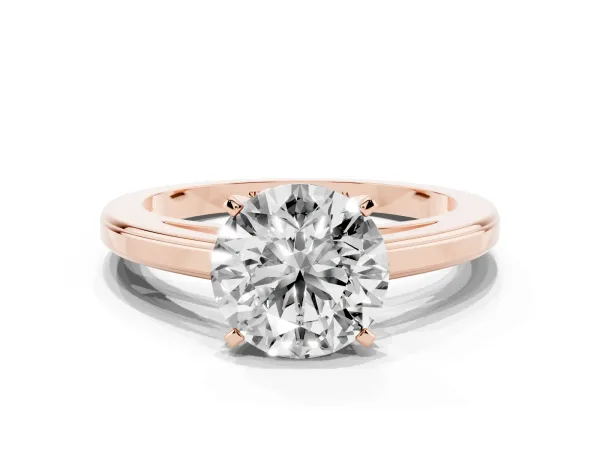 Round Cut Solitaire Diamond Ring with Four-Prong Setting and Classic Band Rose gold