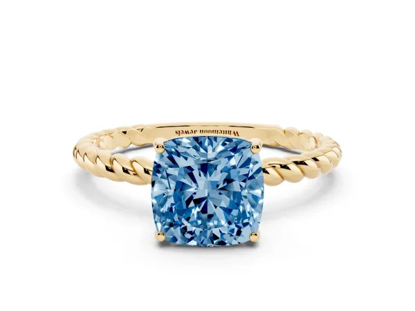 Fancy Blue Cushion Cut Solitaire Twist Band Ring with Four-Prong Setting Yellow gold