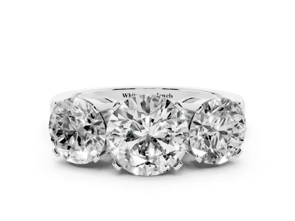 Three-Stone Round Cut Cut Diamond Ring with Channel Set Band and Four-Prong Setting Platinum